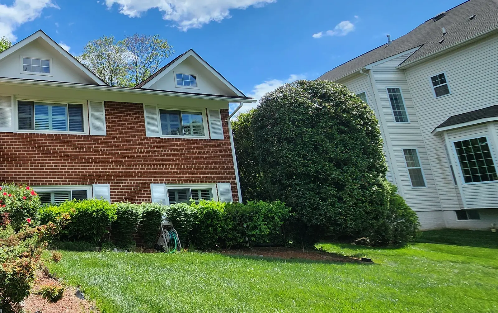 Home in Gaithersburg, Maryland with a completed roof replacement, photographed in spring